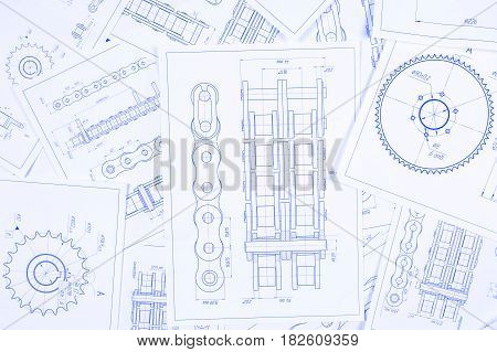 Technical engineering drawing, details of drive industrial chain, sprocket and mechanisms. 
Mechanical engineering, technology of metal processing. Engineer blueprint.