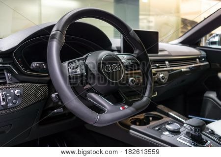 BERLIN - NOVEMBER 09 2016: Showroom. The dashboard of the compact executive car Audi S5 Sportback 3.0 TFSI quattro tiptronic. Produced since 2013 (facelifted).