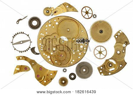 Disassembled clockwork mechanism - various part of clockwork mechanism on white background