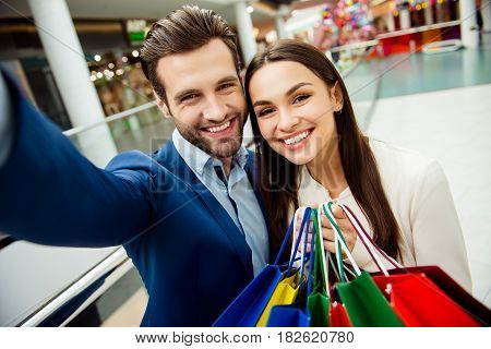 It's Shopping Time With  Sales And Fun. Cute Selfie Portrait Of Cheerful  Successful Happy Young Lov