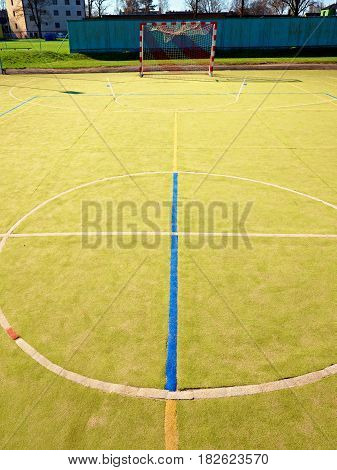 Circle In Middle Of Court. Empty Outdoor Handball Playground, Plastic Light Green Surface