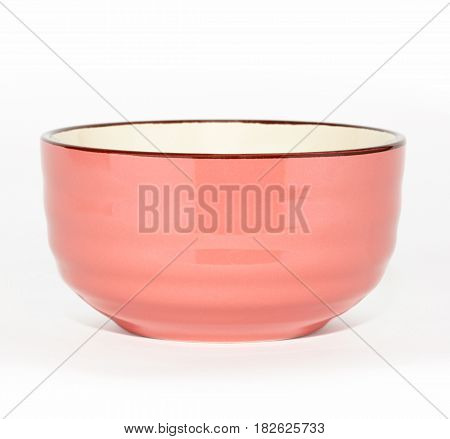 Pink ceramic bowl isolated on white background