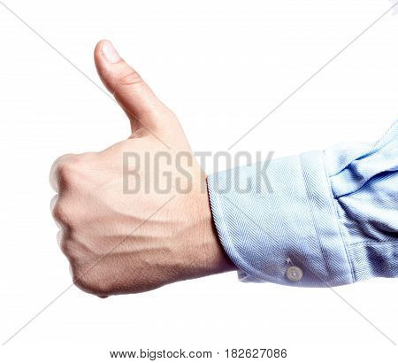 Man's hand isolated on white. Thumb up.