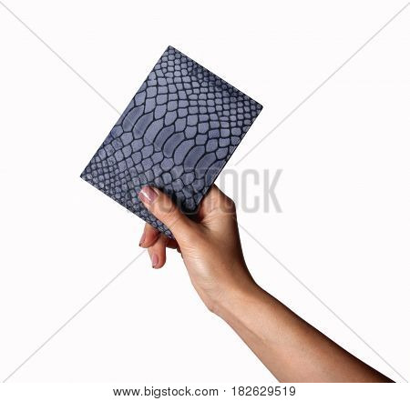 A woman hands hold a gray leather wallet(case, pocket) for passport, credit card on the white desk(table) top view isolated white at the studio.