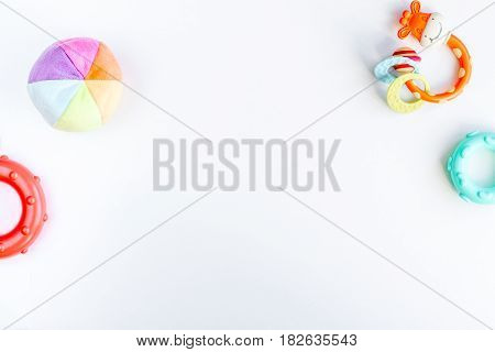 Baby accessories and toys set on white background top view mock up