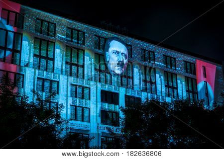 BERLIN - OCTOBER 08 2016: Festival of lights. Historical projection on the facade of the new shopping center "Mall of Berlin" at Potsdamer Platz.
