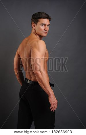 The sexy soldier awaits his lady of love.