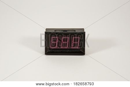 A Small Digital Indicator Is A Voltmeter-ammeter With Colored Wires.
