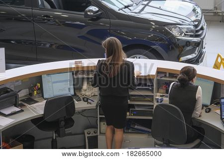 Kaluga, Russia - April, 20, 2017: menegers in a show-room of car dealership of 