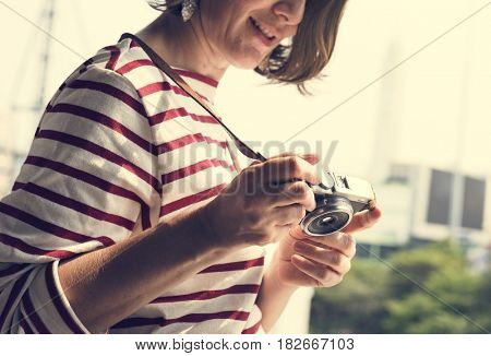 Woman traveler photographer holiday lifestyle trip