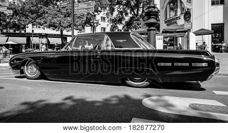 BERLIN - JUNE 05 2016: Personal luxury car Ford Thunderbird (third generation). Lowrider. Black and white. Classic Days Berlin 2016.