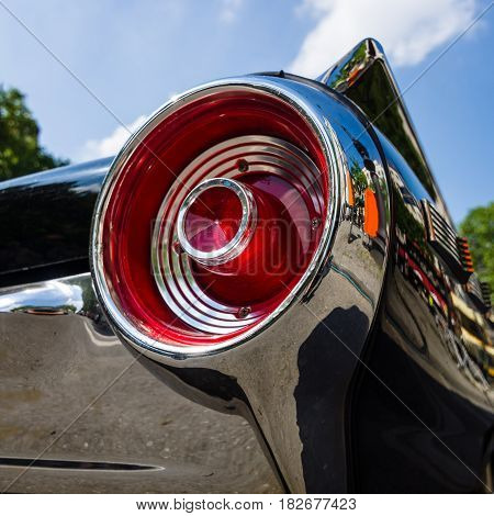 BERLIN - JUNE 05 2016: Stoplight of a personal luxury car Ford Thunderbird (third generation). Close-up. Classic Days Berlin 2016.