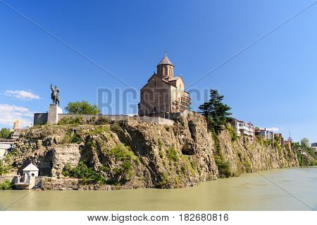 Metekhi Church And Vakhtang Gorgasali Monumen In Tbilisi, Georgia