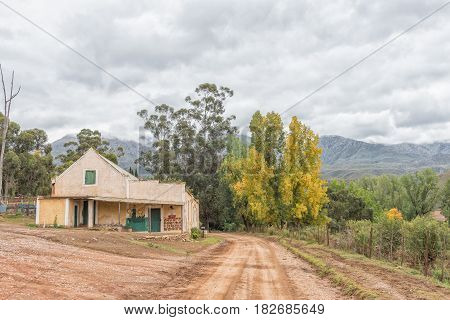 KRUISRIVIER SOUTH AFRICA - MARCH 24 2017: Old building next to the road between the Kruisrivier and Calitzdorp