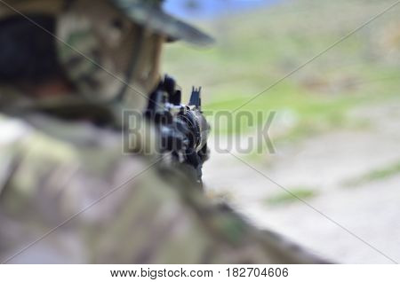 Special forces soldier aim target with sub machine gun