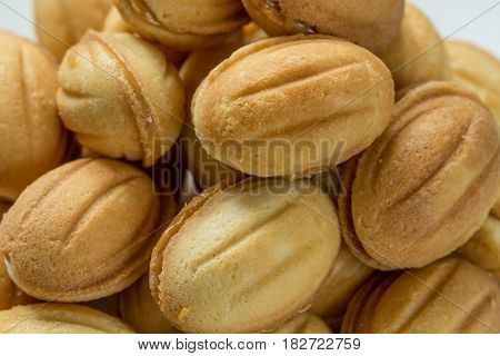 Pile of cookies with boiled condenced milk, close-up