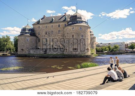 OREBRO, SWEDEN - JULY 7, 2016: The castle of Orebro is a medieval stone building which is one of the most famous and historically significant castles of the Kingdom of Sweden.