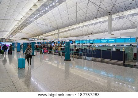 Hong Kong - circa March 2017:  Cathay Pacific check-in counter area inside of Hong Kong International Airport. It is the main airport in Hong Kong. The airport is located on the island of Chek Lap Kok