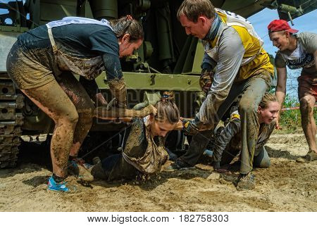 Girl Moves Under Tank In Extrim Race By Team Help