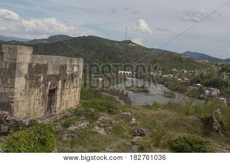 Old fortress ruins clouds landscape. Landscape clouds. old castle in the mountains