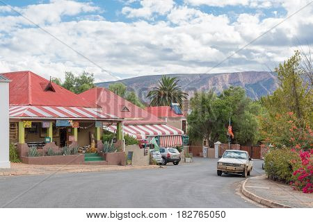 CALITZDORP SOUTH AFRICA - MARCH 24 2017: Historic old buildings in a view of Geyser Street in Calitzdorp