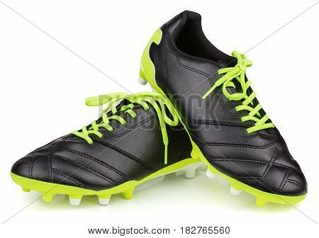 Pair of new unbranded black leather football shoes or soccer boots isolated on white background with clipping path