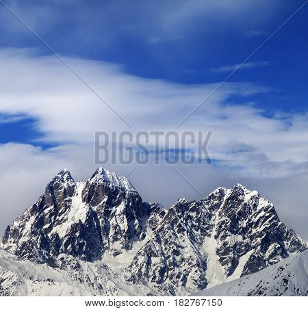Mounts Ushba And Chatyn And Blue Sky With Clouds