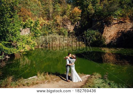Happy Couple Walking In Summer Park