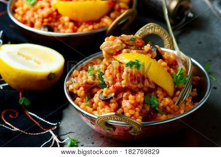 lemony chicken stew giant couscous ..selective focus