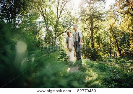 Happy Couple Walking In Summer Park