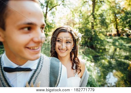 Happy Couple Walking In Summer Park