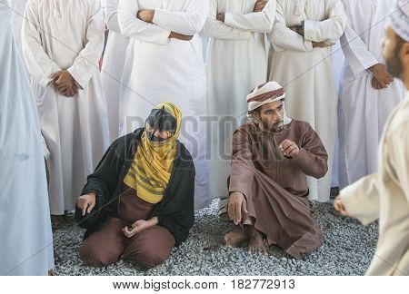 Omani Couple At A Market