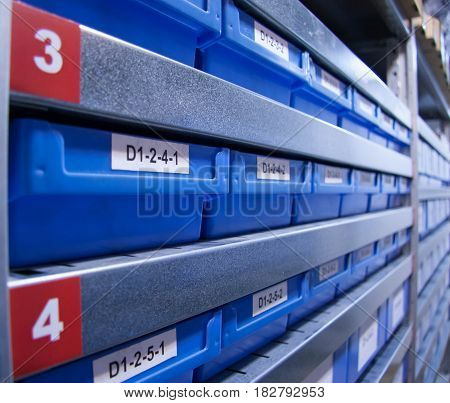 numbered locations in the warehouse blue plastic