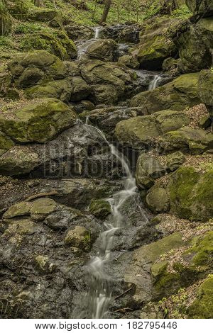Waterfall near Moravany village in spring green day