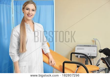 Young beautiful doctor in gynecological room