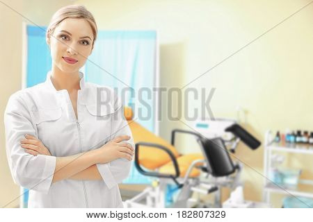 Young beautiful doctor in gynecological room