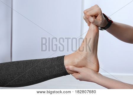 Physiatrist doing foot massage