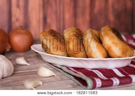 fried patties with potatoes rustic style .