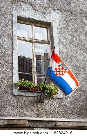 Croatian flag in the window of the old house Zagreb, Croatia