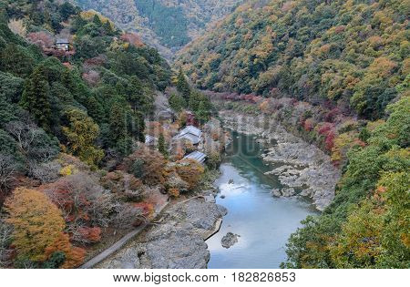 Stunning Autumn Color Landscape Of Asashiyama Mountain And Hozugawa River In Kyoto, Japan