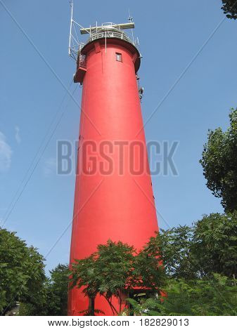 Lighthouse in Krynica Morska (Poland). The lighthouse on the Polish Baltic coast in the town of Krynica Morska on the Vistula Spit, built in 1951 in place of the old lighthouse destroyed in 1945. The lantern is 26.5 meters high.