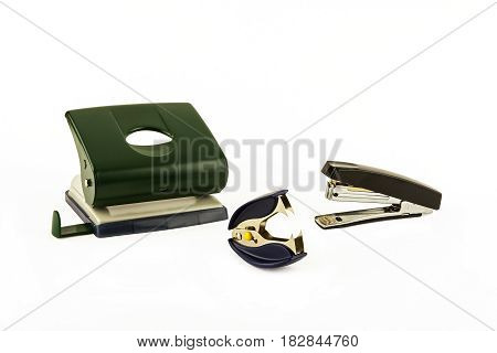 On a light background punch stapler and anti-stapler