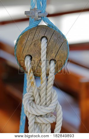 Wooden naval block to tie ropes to sailboats