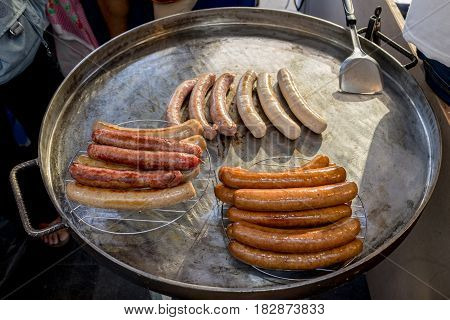 iron pan with traditional thai sausages fried spicy hot