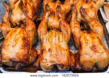 traditional spicy tasty grilled chicken with herbs street food