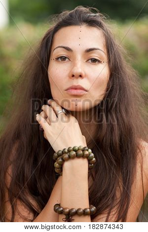 Porrait of beautiful hippie girl. Summer time