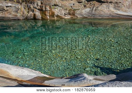 crystal clear green see through water river outdoor on day light