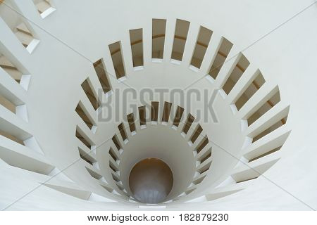 South Korea - March 11 2014: Top view of White spiral staircase in Samsung Museum. In Seoul South Korea