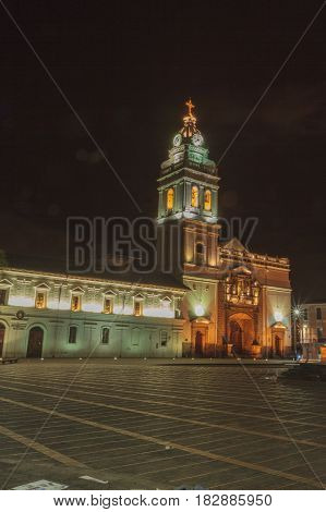 Santo Domingo Church at clear night from plaza