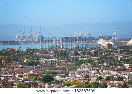 Aerial view of Long Beach harbor - biggest shipping port of USA with containers, hoists and ships